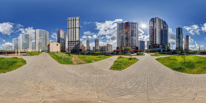 hdri 360 panorama near new skyscrapers and residential complex in full equirectangular seamless spherical projection