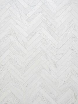 Elegant White Marble Herringbone Tile Pattern Texture for Modern Interior Design and Architectural Background