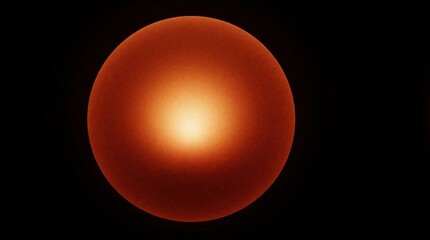 Fototapeta premium Abstract glowing orange sphere on black background. Warm light center diffuses through dark space. Minimalist circular shape creates soft gradient effect. Red cosmic energy looks like sun core of