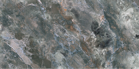 A sophisticated dark grey marble texture featuring intricate white and pale blue mineral veins, smoky charcoal patterns, and striking copper-orange rust accents. The natural stone-inspired design. © INFIMAGINE