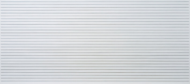 White paper sheet with horizontal black lines, lined notebook texture