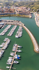 Fototapeta premium Zumaia marina aerial view with boats and town