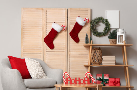 Christmas home interior holiday season preparation and festive living room decor with stockings gifts and seasonal ornaments for winter celebration