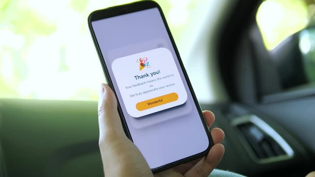 Customer submits a star rating on a smartphone and receives a thank-you message, highlighting digital feedback, online reviews and the growing importance of customer experience.