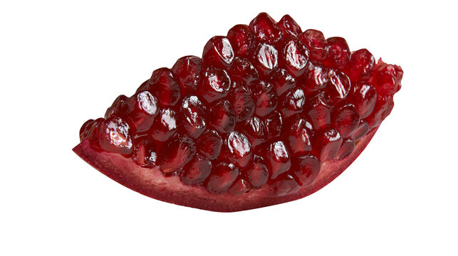 Fresh ripe pomegranate fruit segment with juicy red arils