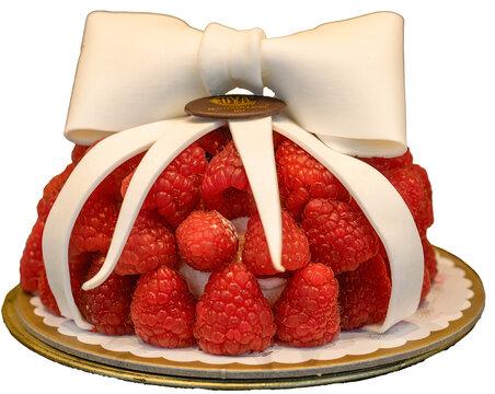 A stunning raspberry cake shaped like a gift parcel with a large white bow from the historic Cova Montenapoleone 1817 patisserie. Milan &ndash; Italy, 9 October 2026