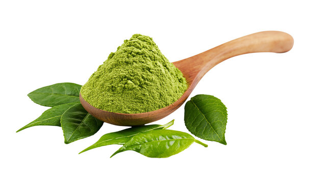Matcha green tea powder in a wooden spoon with fresh tea leaves