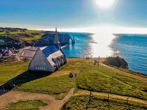 Etretat, 15.09.2026, France, Aerial view of Chapelle Notre-Dame-de-la-Garde, Etretat beach, Porte dAval and Aiguille cliffs in Normandy