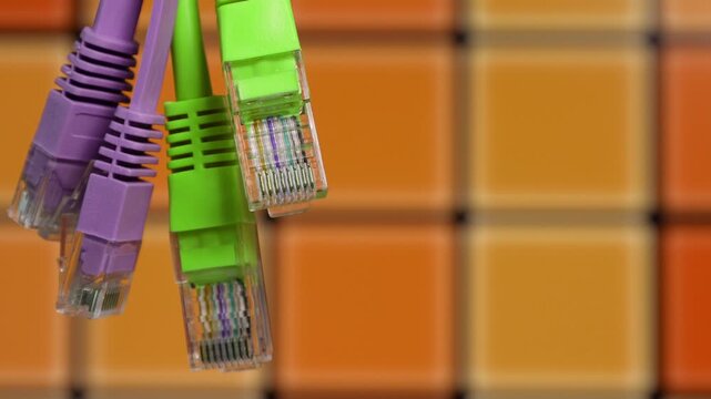 Close-up view of multiple colorful Ethernet cables plugged in, symbolizing stable and reliable network connections.