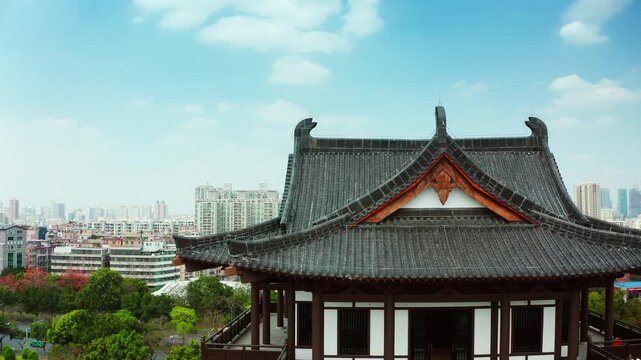 Decorated gable and curved eaves at Guangzhou Cultural Center