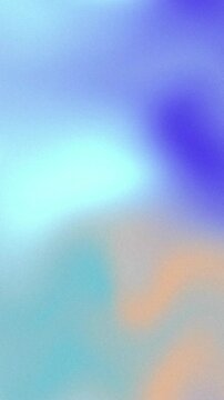 Abstract soft pastel gradient background with glowing blue and peach ethereal color blends.