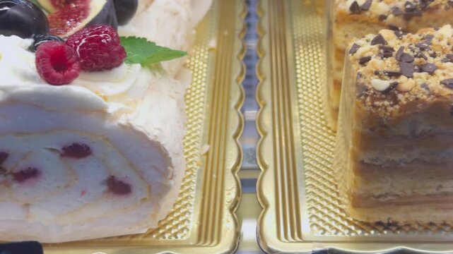A shop display showcases an assortment of sweet pastries