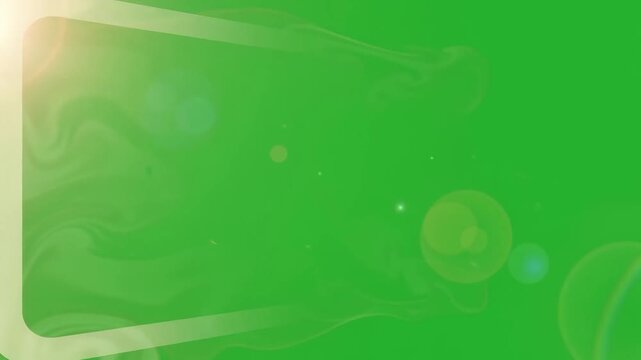 Shining golden hologram frame border glow with bright lens flare light reflection bokeh effect on chroma key green background copy space