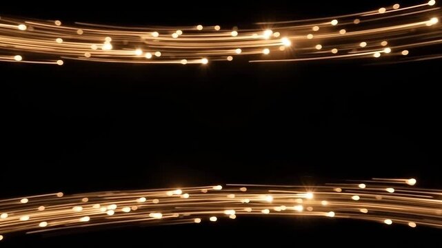 sweeping golden light trails and glowing particles framing the top and bottom of the pure black center