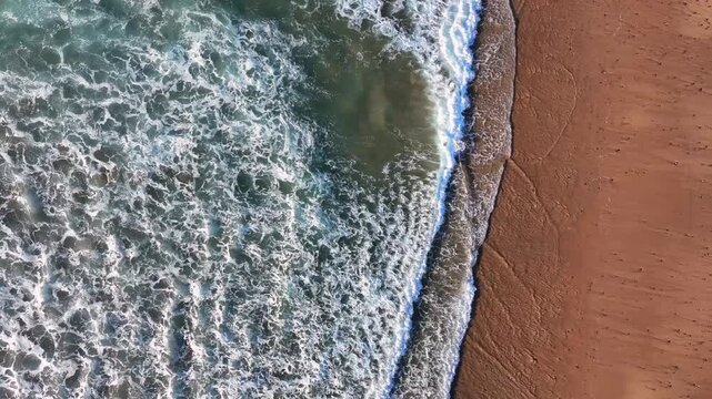 Aerial top-down view of ocean waves in the Atlantic Ocean