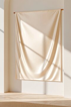 Cream satin fabric draped on wooden rod in sunlit minimalist room with soft shadows and warm tones