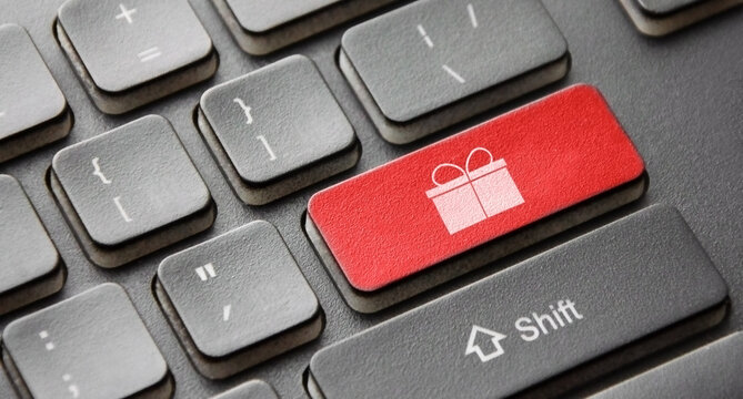 Close-up of a gift purchase button on a laptop keyboard