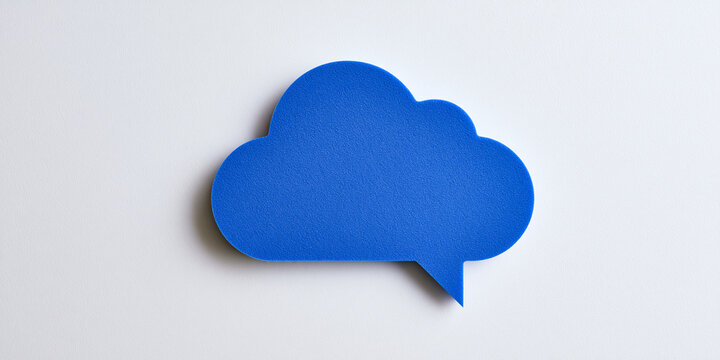 Blue paper cloud speech bubble on white background