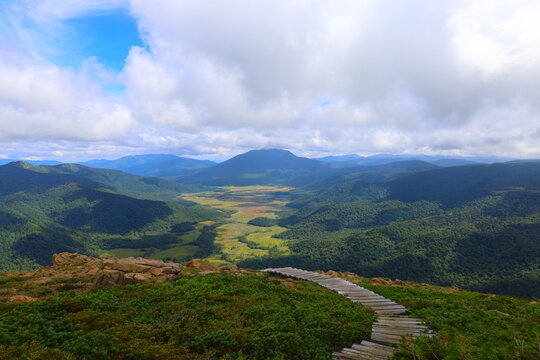 Breathtaking view of Ozegahara Marshland and Mount Hiuchigatake from the trail of Mount Shibutsu, Japan