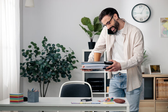 Busy man multitasking working from home managing many tasks