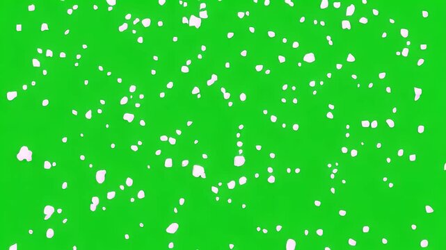 White snowflakes falling against a green screen chroma key background for festive Christmas and New Year 2027 video compositing.