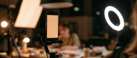 Smartphone mounted on tripod with ring light for © Generative AI