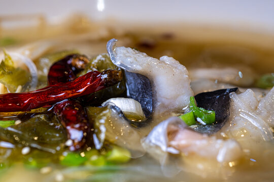 Chinese suan cai yu sour fish soup macro