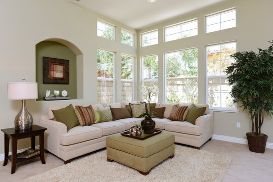 Close view of compact suburban living room with clerestory windows in clear daylight