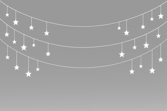 Luminous hanging star chains forming graceful festive arcs with varied drops and soft white shine