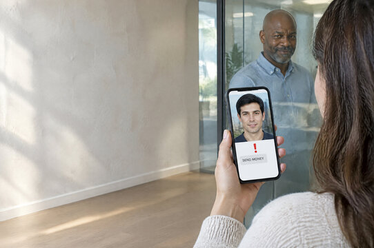 Woman Pauses At A Dating Profile with A Money Request While A Different Man Smirks Behind Glass