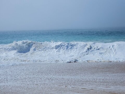 Closer view of waves of Praia do Norte Nazar&eacute; Portugal