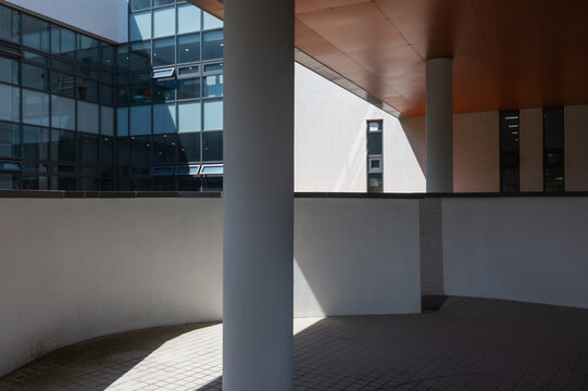 Modern Architecture Exterior with Concrete Column and Orange Ceiling