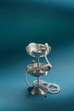 Pearls and spheres in silver dessert stand