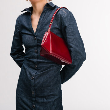 Denim Jacket With Red Handbag