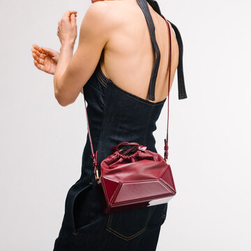 Backless Denim Dress With Red Leather Bag