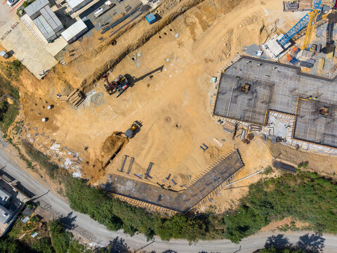 Construction Site Tower Crane And Reinforced Concrete Foundation Rebar