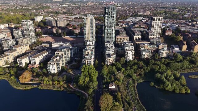 Aerial view of Woodberry Downs high-rise towers built beside the East and West Reservoirs in Hackney, London, for urban regeneration.