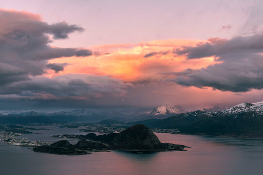 &Aring;lesund town seen from Alnes, Town during the sunset, fjords, clouds and golden hour colors