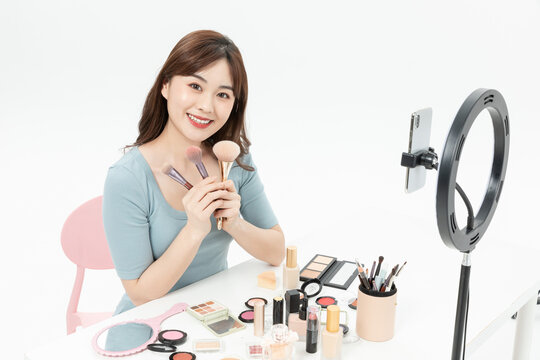 Beauty Influencer Live Streaming Makeup Tutorial with Ring Light and Cosmetics