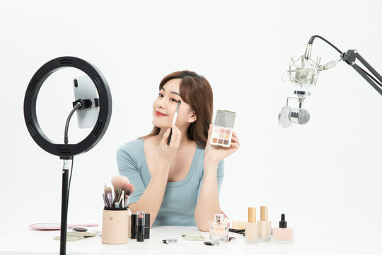 Beauty Influencer Live Streaming Makeup Tutorial with Ring Light and Microphone