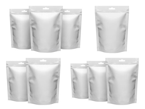 Set of white stand up zipper pouches with hang holes, isolated on transparent cutout background