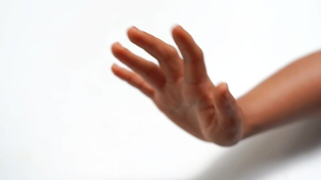 Hand Rotating to Both Sides in a Refusal Gesture on White Background.