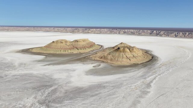 Advancing Across Salt Crust Toward Karynzharyk's Isolated Buttes