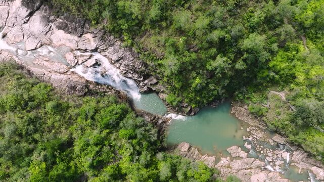 Big Rock Falls in the jungle of central Belize, aerial drone shot