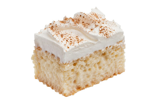 Delicious slice of tres leches cake topped with whipped cream and a sprinkle of cinnamon, isolated on a clean white background