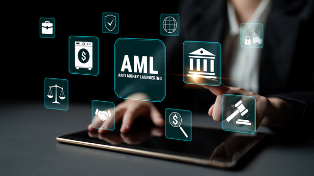 Business professional interacting with virtual icons related to anti-money laundering and compliance regulations on a tablet device in a modern office setting. Glyphic.