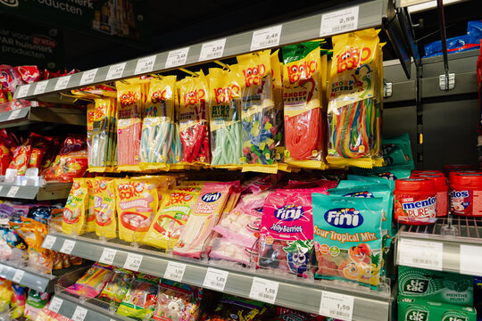 September 24, 2026, Amsterdam, Netherlands - Candy and sweets on display in a SPAR supermarket aisle