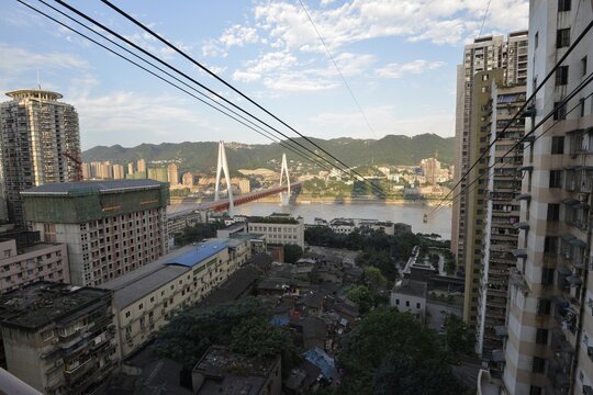 Old and new high-rises at the Yangtze cable car, on the Yangtze River, Chongqing, China