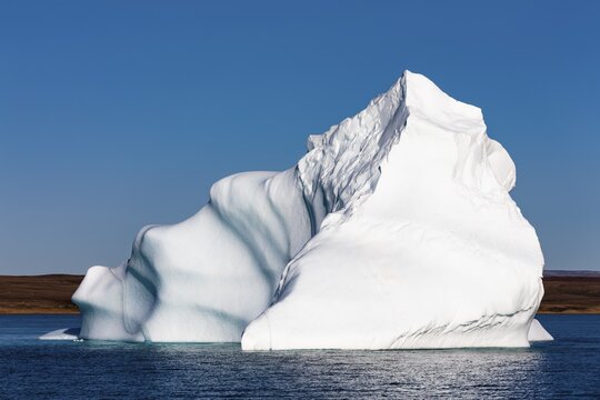 Striking iceberg, Scoresbysund, East Greenland, Greenland