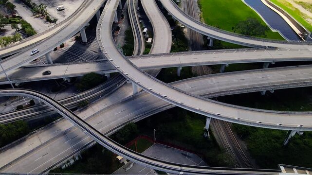 Aerial 4K video shows vehicles crossing a Jacksonville interchange on elevated ramps.